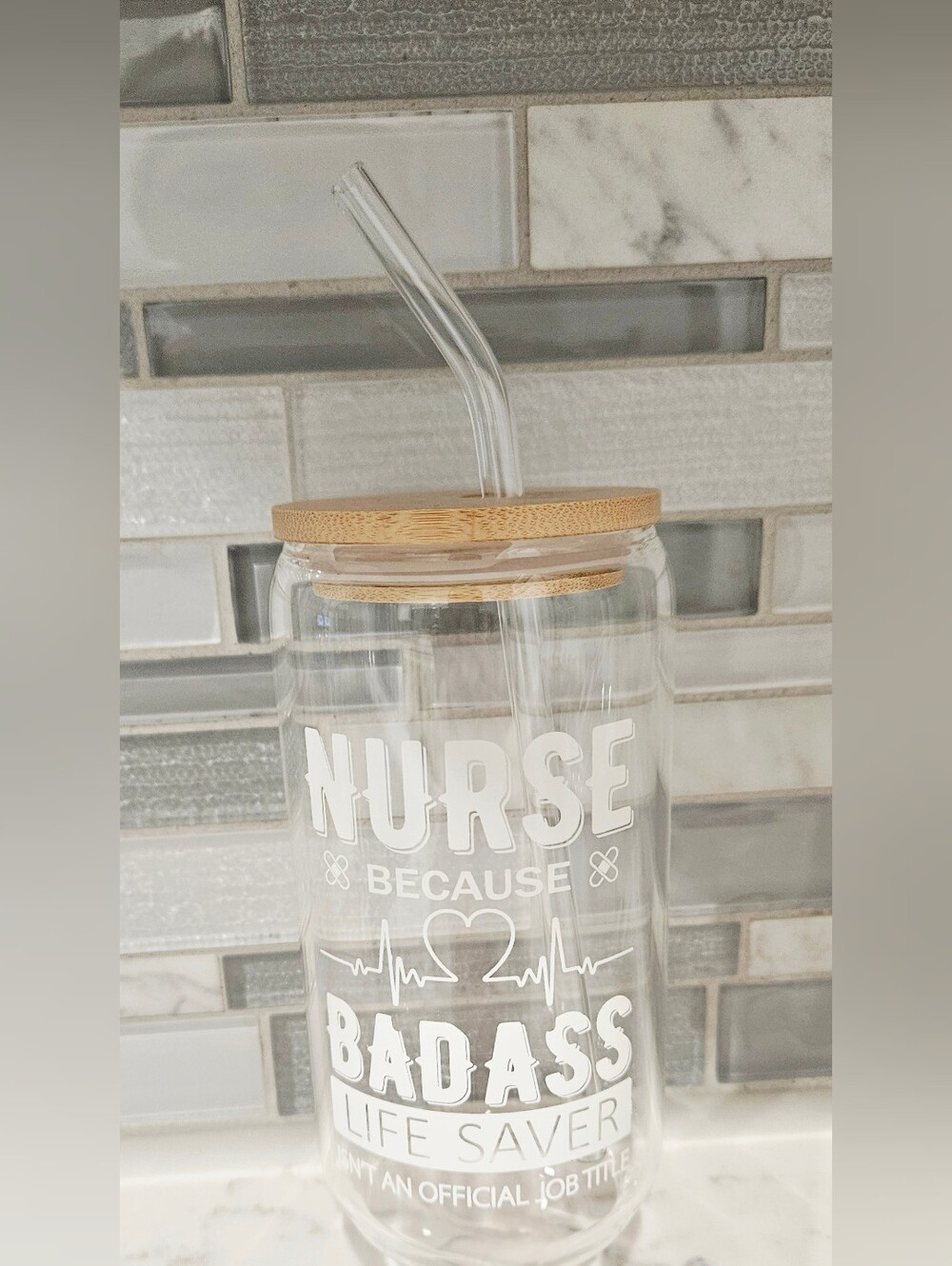 Clear 'Nurse Because Bada** Life Saver' Glass Tumbler with Bamboo Lid